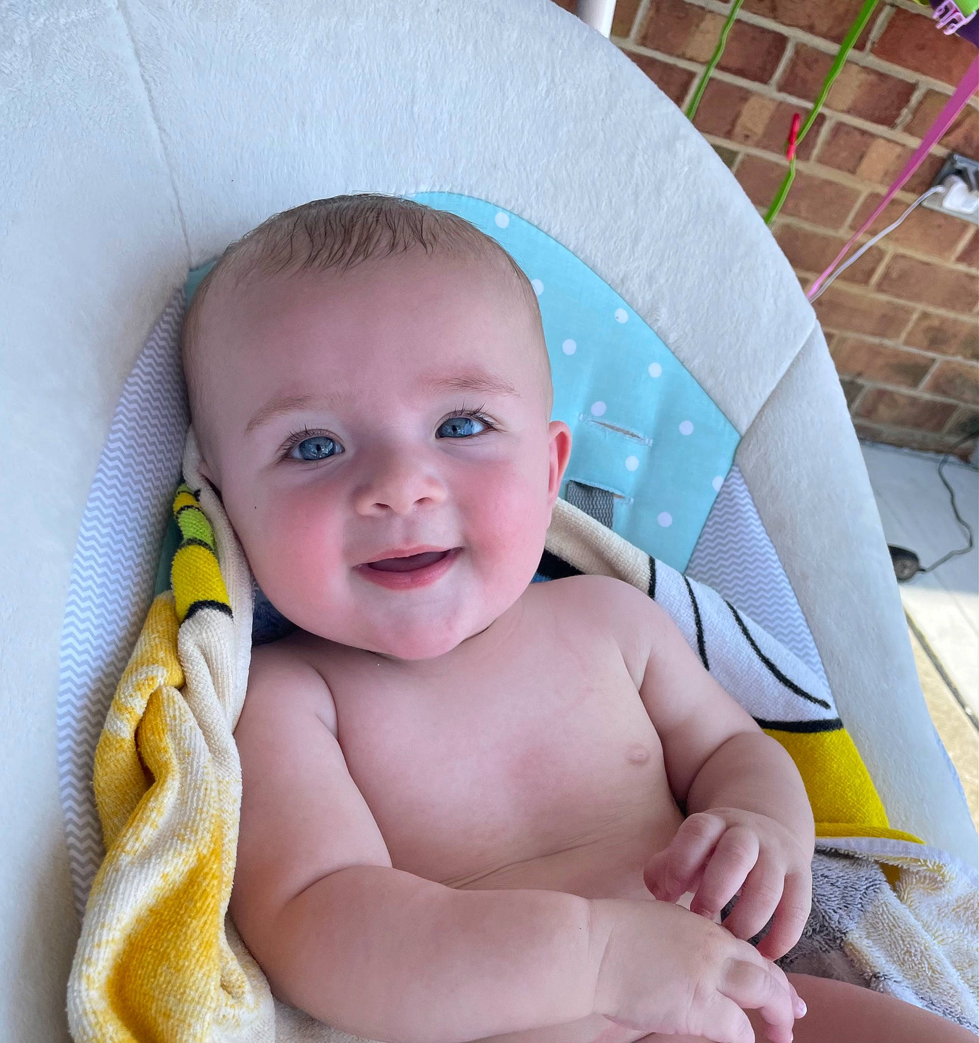 Murphy joined the competition — help win amazing prizes! baby, baby_products, baby_safety, baby_toddler_clothing, bathing, cheek, chest, child, comfort, finger, happy, iris, linens, person, pink, sitting, skin, smile, stomach, thumb