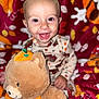 baby, child, smiling, happy, plush_toy, teddy_bear, halloween, pumpkin, autumn, blanket, cozy, cute, indoors, portrait, infant, cute_clothing, toy, fall_colors, warm, joyful