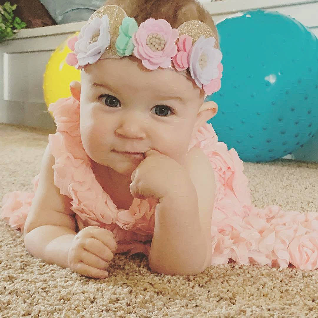 Aislynn joined the competition — help win amazing prizes! baby, baby_toddler_clothing, child, child_model, ear, fashion_accessory, fur, hair_accessory, head, headband, headgear, headpiece, lace, outerwear, pattern, person, pink, skin, smile, textile