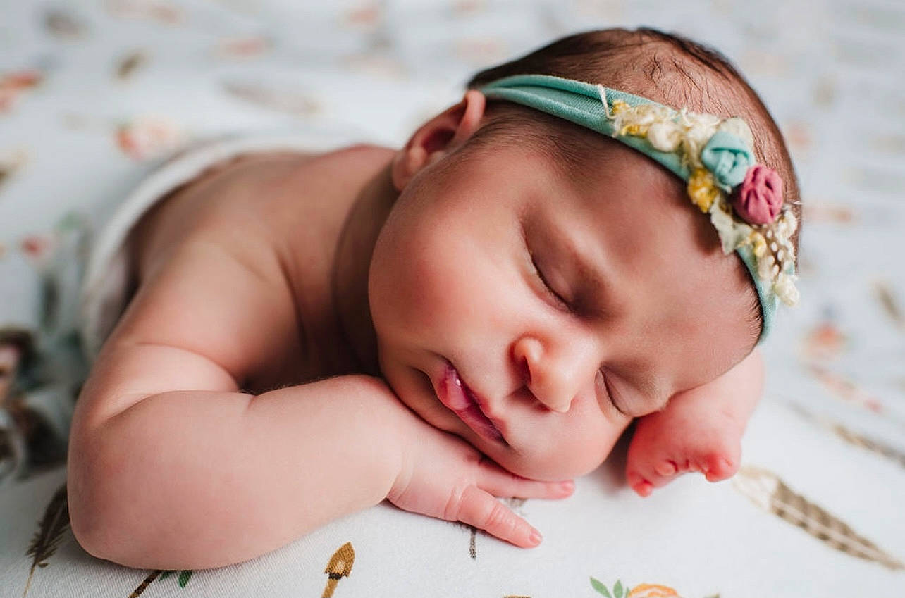 Brooklyn is registered to the contest to win money with this photo: baby, baby_sleeping, baby_toddler_clothing, cheek, chin, comfort, eye, eyebrow, eyelash, face, finger, happy, head, headgear, headwear, iris, mouth, neck, nose, person