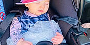 Camélia participe au concours pour gagner de l'argent avec cette photo : baby, car_interior, car_seat, child, closed_eyes, cute, dress, hands, hat, infant, peaceful, pink_hat, portrait, safety_strap, seat_belt, seat_buckle, sleeping, small_person, tights, tutu