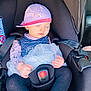 baby, car_interior, car_seat, child, closed_eyes, cute, dress, hands, hat, infant, peaceful, pink_hat, portrait, safety_strap, seat_belt, seat_buckle, sleeping, small_person, tights, tutu