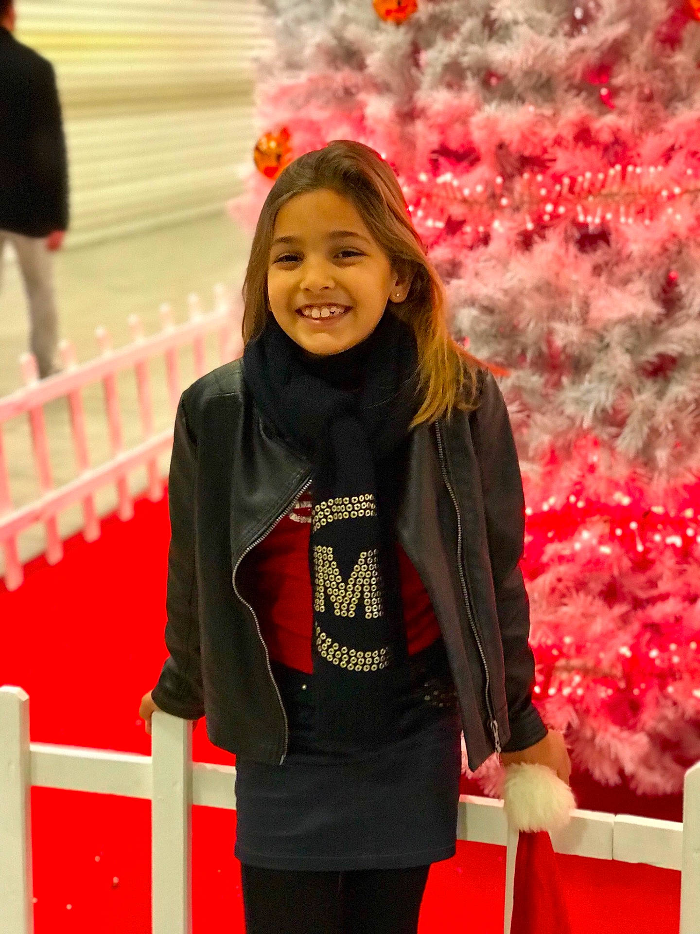 Adriana participe au concours pour gagner de l'argent avec cette photo : child, day, facial_expression, fun, girl, happiness, joy, material, outerwear, person, plant, product, red, smile, socialite, textile