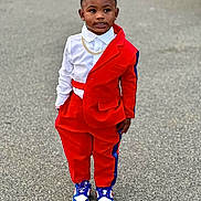 Kylon joined the competition — help win amazing prizes! child, boy, red_suit, white_shirt, gold_chain, blue_sneakers, pavement, smile, fashion, street, earrings, short_hair, standing, outdoor, casual, confidence, portrait, young, cute, stylish