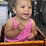 Jersey joined the competition — help win amazing prizes! toddler, child, baby, pink_dress, high_chair, blue_eyes, curly_hair, indoor, smiling, happy, person, wooden_chair, seated, clothing, hand, face, skin, furniture, background, casual