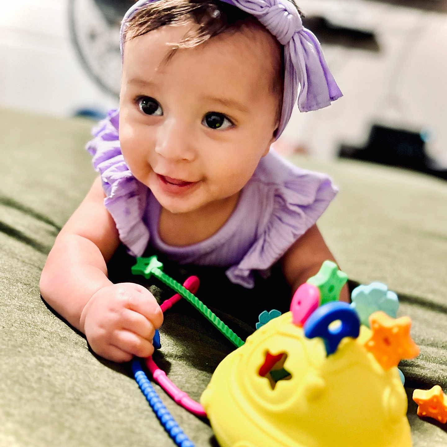 Aria is registered to the contest to win money with this photo: accessories, baby, birthdaycake, bodypart, cake, clothing, cream, dessert, face, finger, food, hand, hat, head, icing, person, photography, portrait, sphere, toy