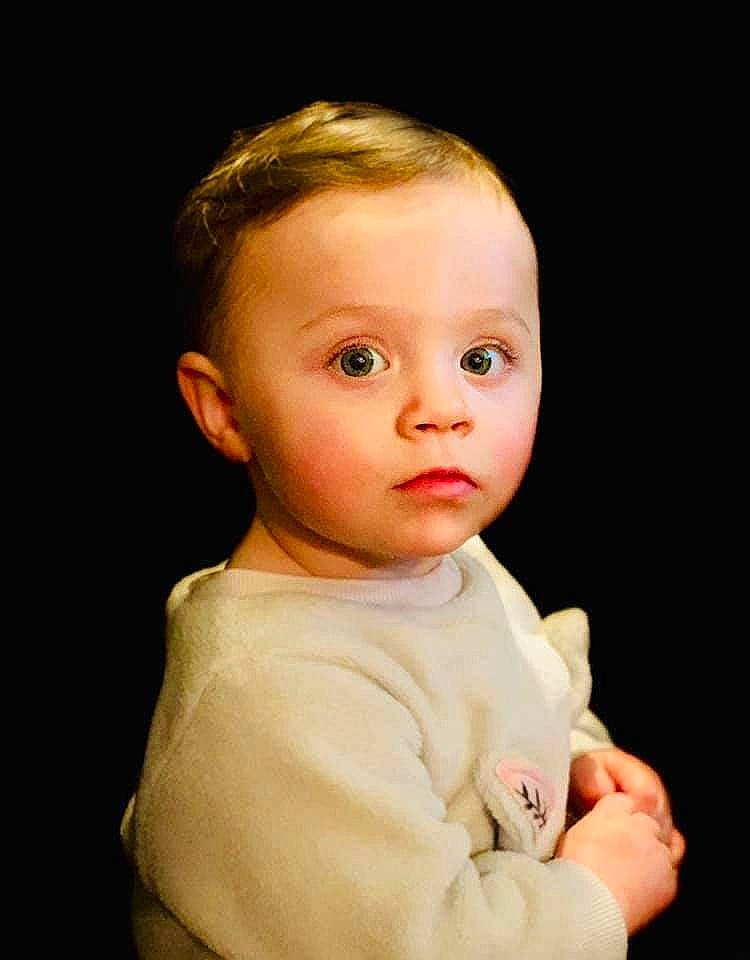 Lacie is registered to the contest to win money with this photo: baby, cheek, child, chin, face, head, lip, person, portrait, toddler