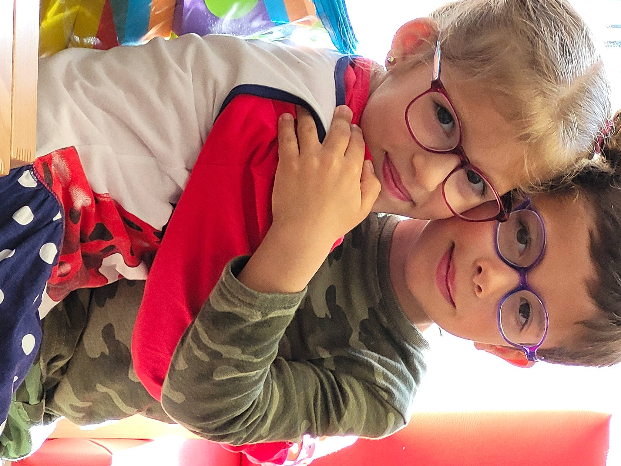 Iliana participe au concours pour gagner de l'argent avec cette photo : black_hair, child, cool, event, eyewear, finger, fun, gesture, glasses, happy, leisure, mouth, nail, nose, person, recreation, red, skin, smile, toddler