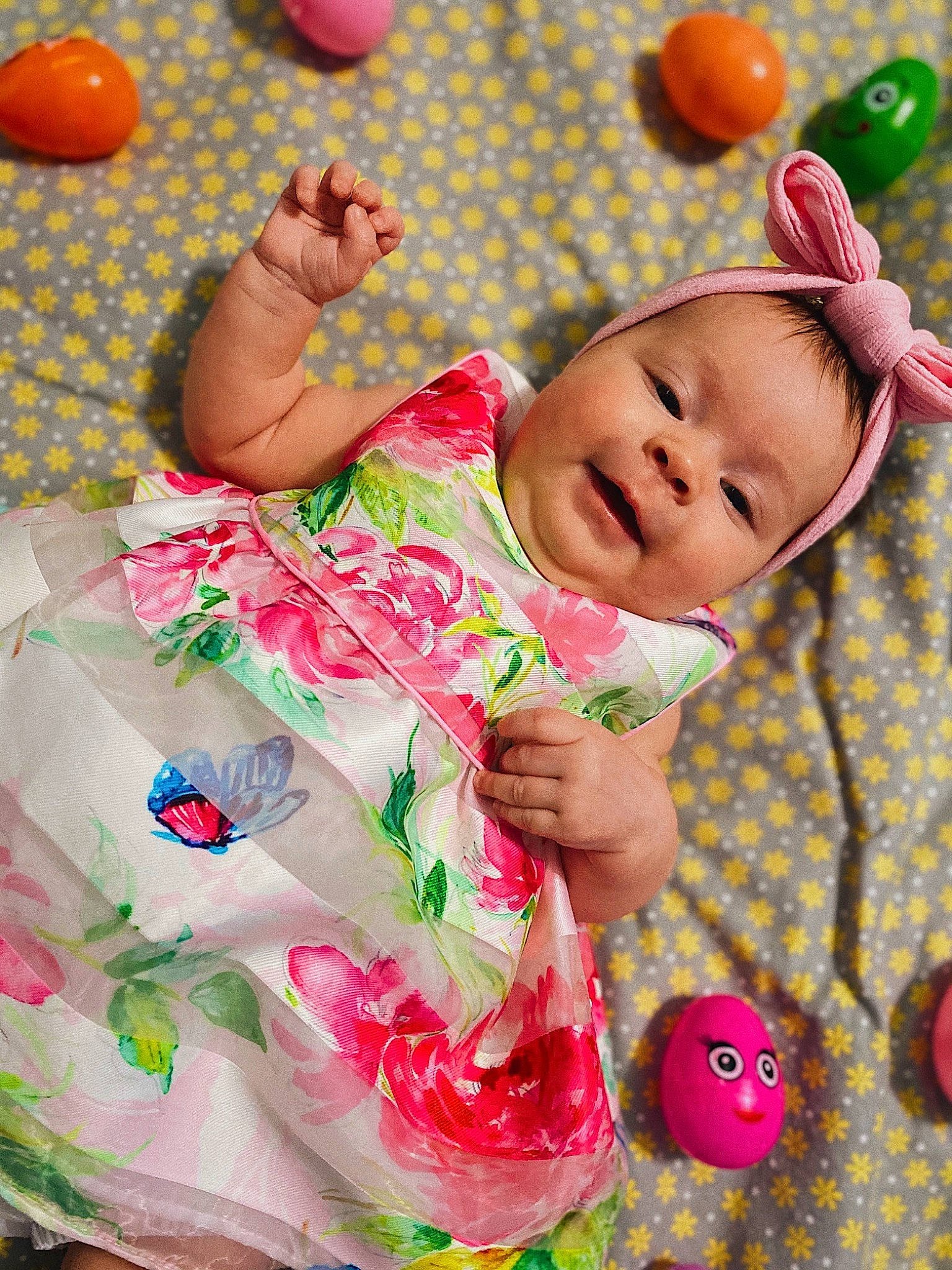 Leilani joined the competition — help win amazing prizes! baby, baby_products, baby_toddler_clothing, cheek, child, design, finger, fun, grass, green, happy, leisure, pattern, person, pink, play, skin, sleeve, textile, toddler