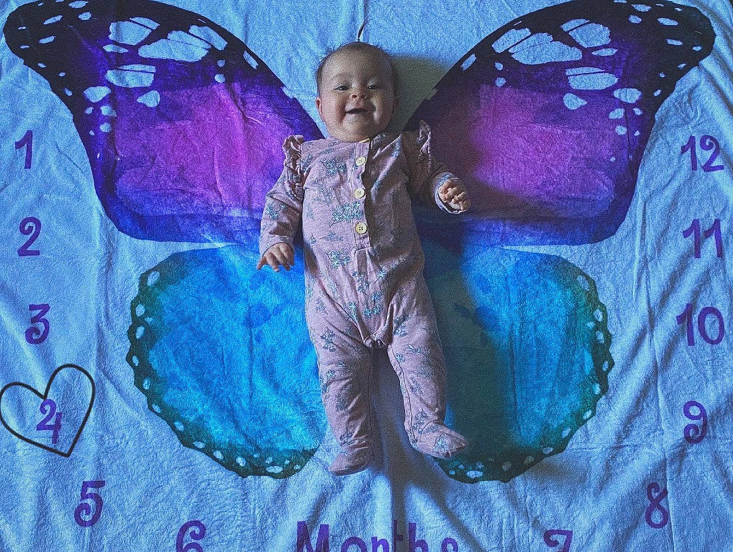 Leilani joined the competition — help win amazing prizes! art, arthropod, azure, butterfly, electric_blue, eye, graffiti, head, insect, magenta, organism, paint, painting, person, pink, pollinator, purple, smile, symmetry, umbrella