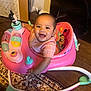 Meilani is registered to the contest to win money with this photo: baby, child, walker, pink, smile, indoor, toy, minnie_mouse, pigtails, happy, floor, carpet, calendar, person, cute, infant, playful, clothing, face, furniture