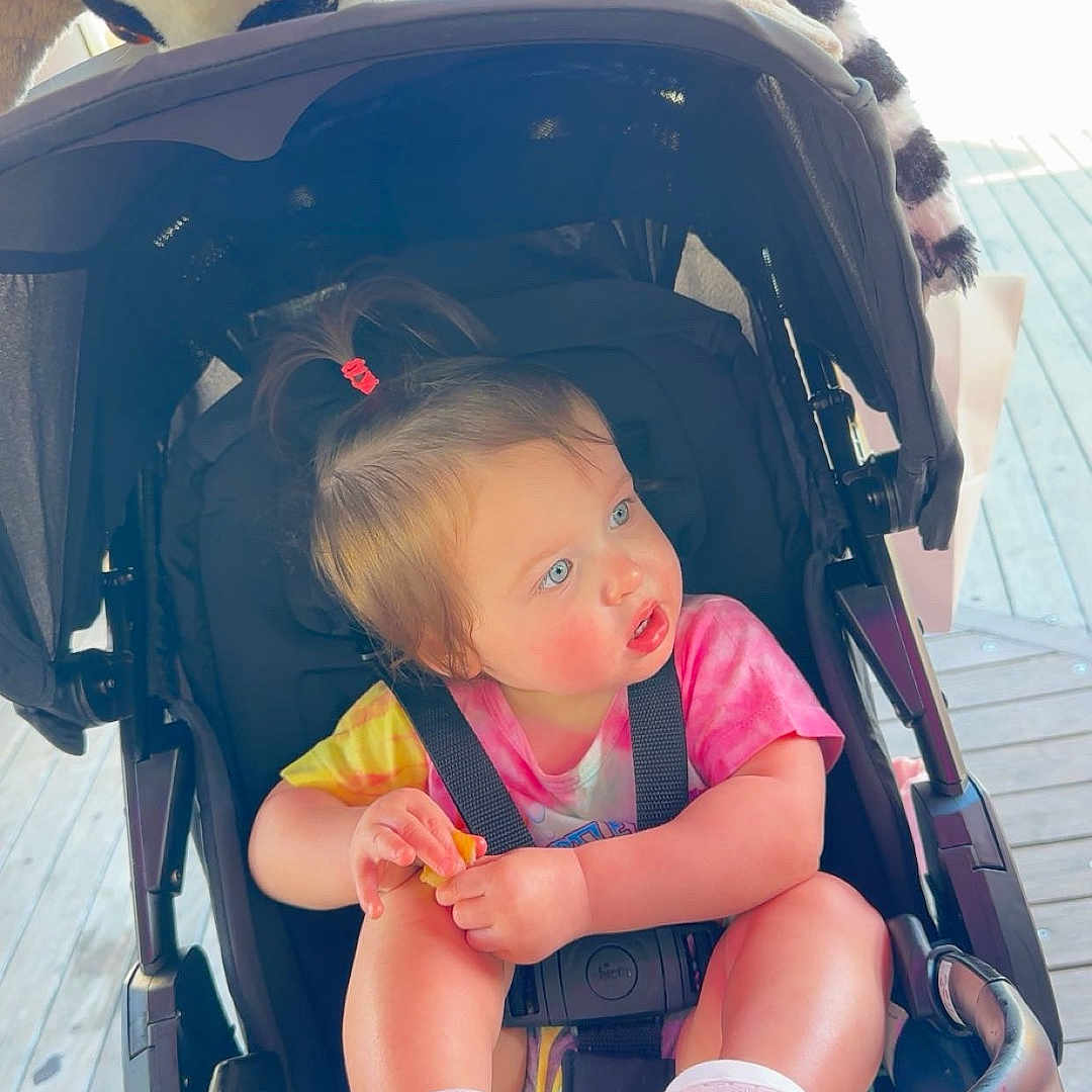 Annalisa joined the competition — help win amazing prizes! animal, baby, cat, city, clothing, face, gun, head, hosiery, outdoors, person, pet, photography, portrait, road, sock, street, stroller, urban, weapon
