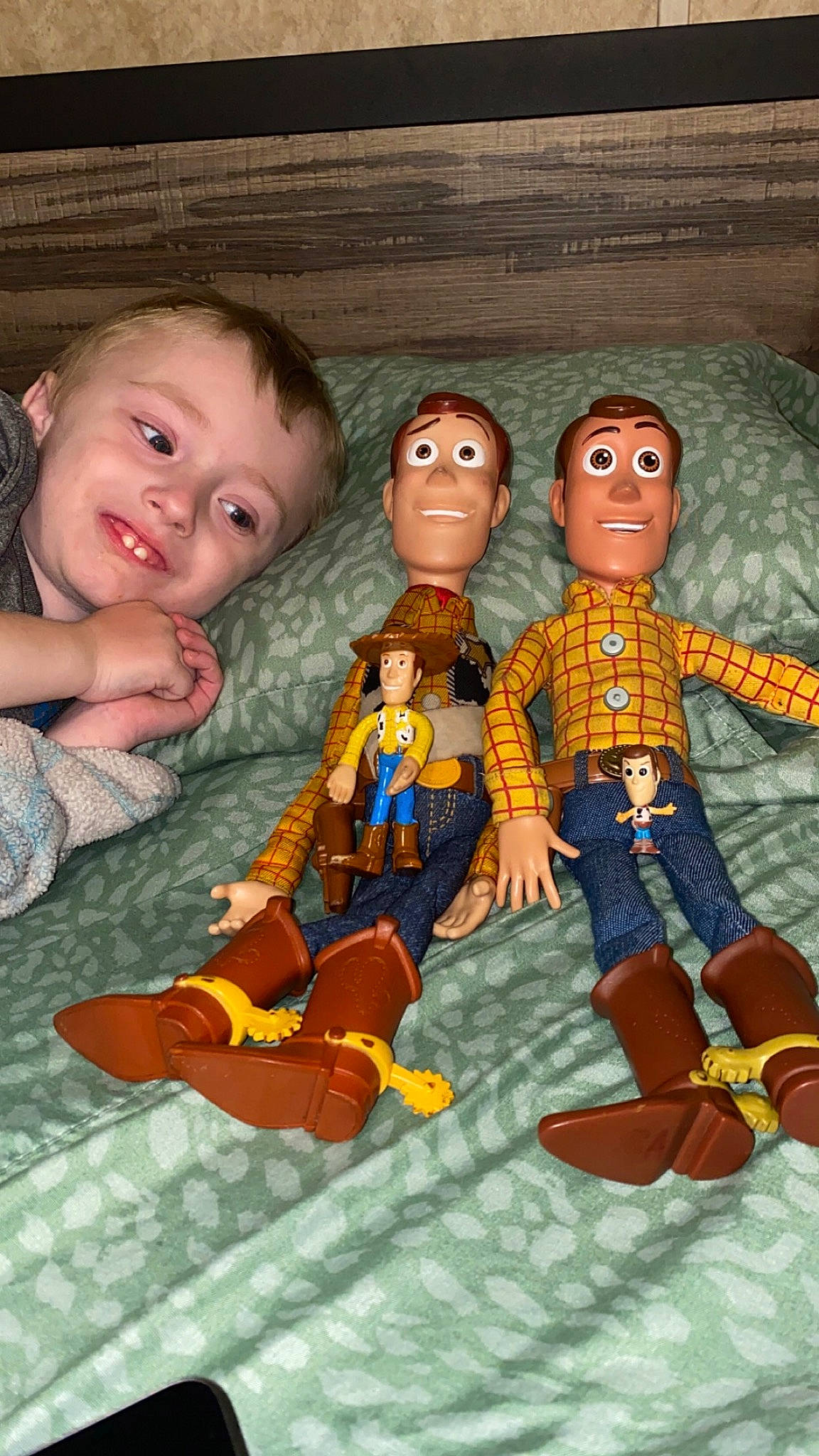 Ezra is registered to the contest to win money with this photo: action_figure, animation, art, child, doll, fashion_design, fictional_character, figurine, flooring, fun, head, jewellery, pattern, person, stuffed_toy, toddler, toy, wood