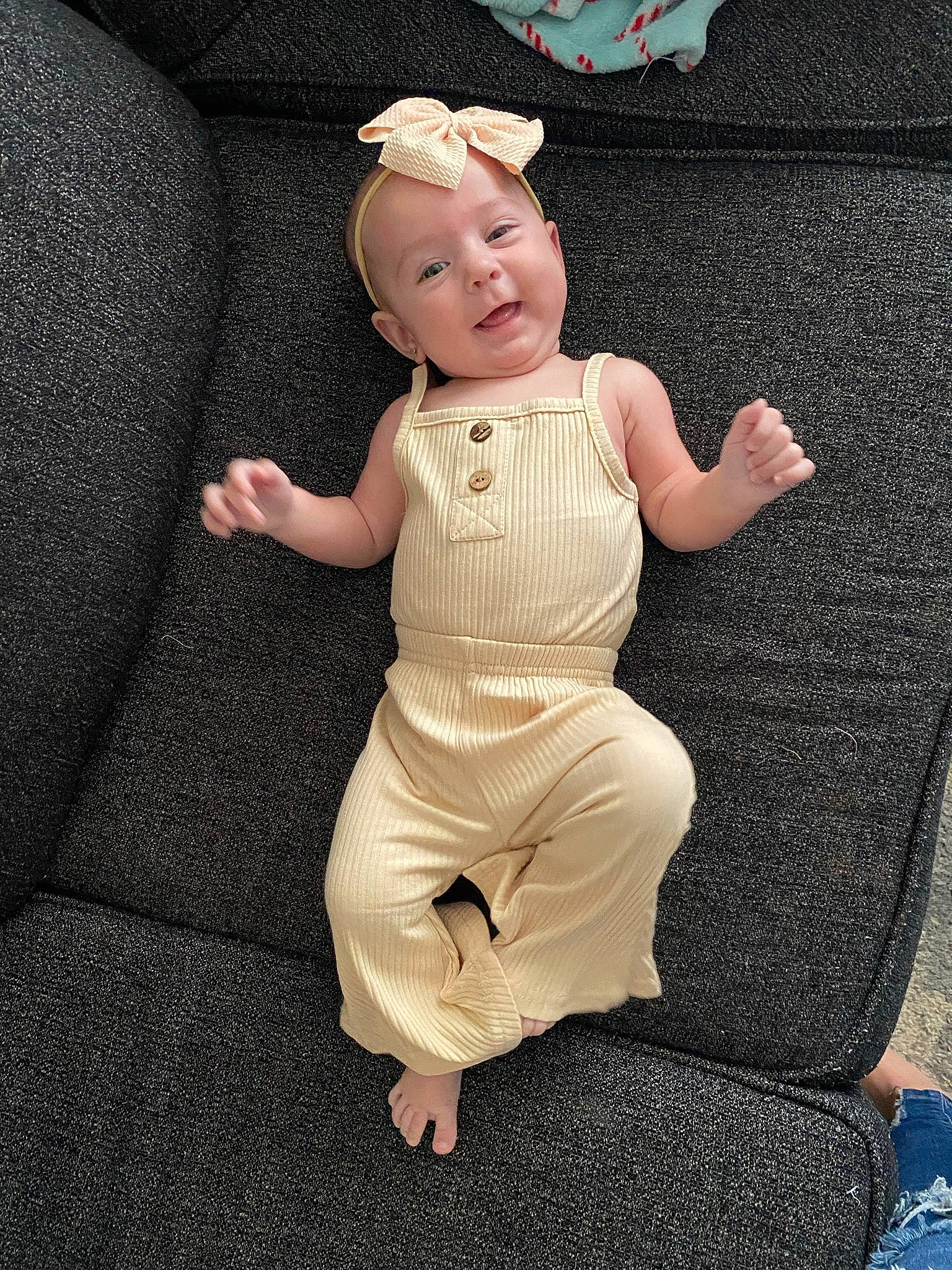 Landry joined the competition — help win amazing prizes! abdomen, baby, baby_toddler_clothing, barefoot, costume_hat, fashion_accessory, finger, foot, gesture, headpiece, human_leg, jewellery, necklace, person, sitting, sleeve, thigh, toddler, trunk, waist