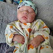 Ernest joined the competition — help win amazing prizes! baby, sleeping, infant, onesie, cap, blanket, pillow, nasal_tube, soft_toys, cozy, child, cute, resting, indoor, person, portrait, closeup, colorful_clothing, newborn, peaceful