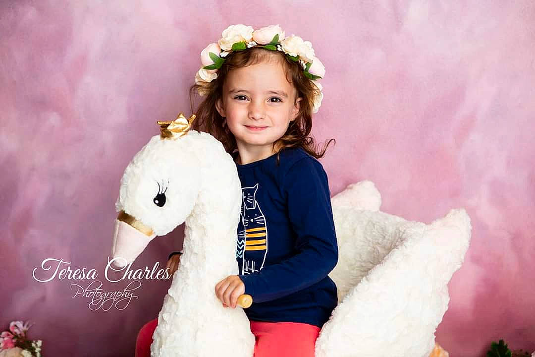 Baylee joined the competition — help win amazing prizes! _geese_and_swans, beak, beauty, dress, ducks, event, face, flash_photography, formal_wear, fun, happy, head, joy, people_in_nature, person, photograph, pink, skin, smile, toddler