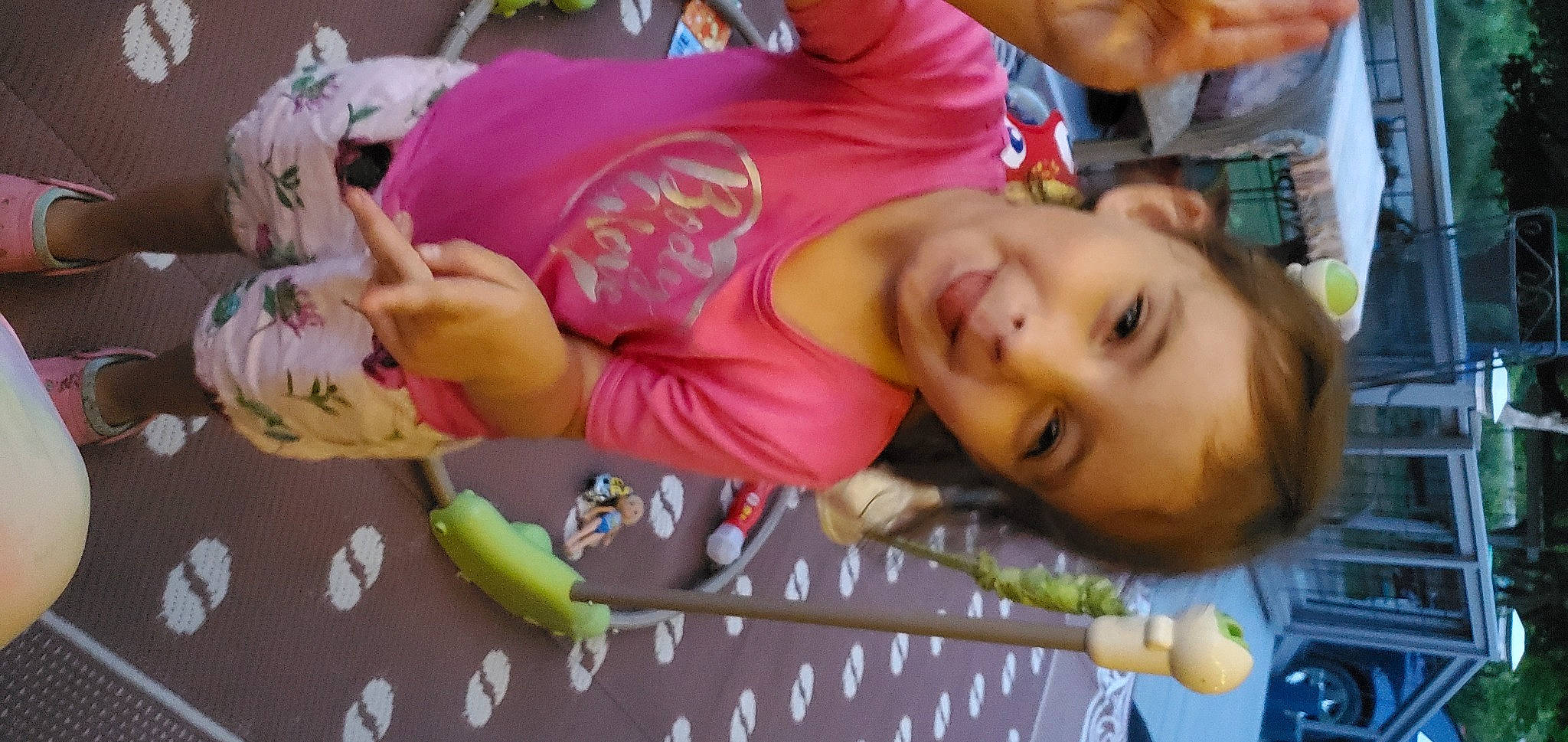 Baylee is registered to the contest to win money with this photo: arm, baby, banana, child, event, facial_expression, finger, fruit, fun, happy, joy, leisure, mouth, person, plant, play, room, skin, smile, toddler