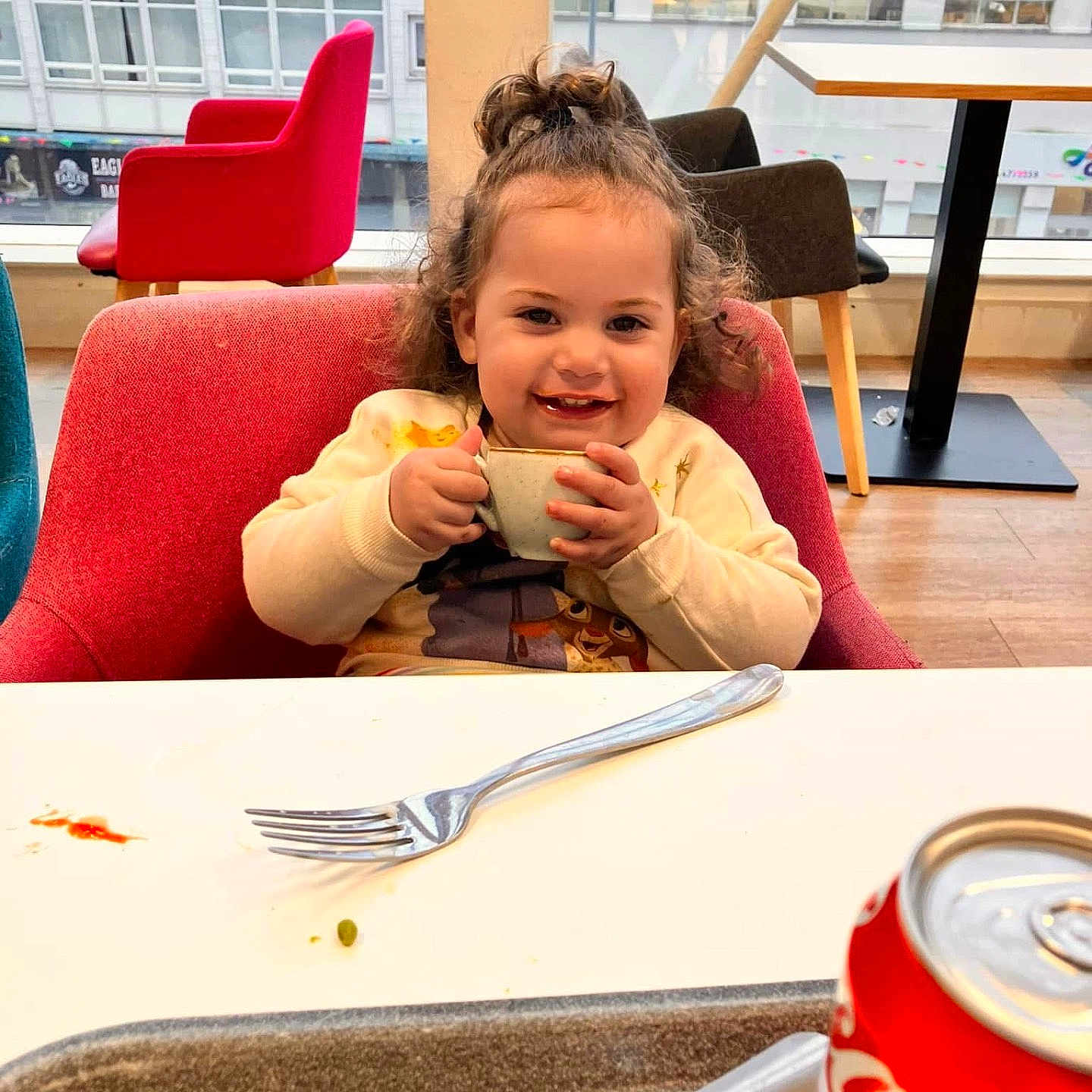 Sophie Lynn is registered to the contest to win money with this photo: architecture, building, child, cup, cutlery, diningroom, diningtable, face, food, fork, furniture, head, indoors, meal, person, photography, portrait, room, spoon, table