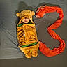 Sitara joined the competition — help win amazing prizes! child, sleeping, costume, bear, orange_scarf, grey_background, soft_texture, cute, indoor, resting, cozy, blanket, toddler, clothing, portrait, baby, fabric, headwear, peaceful, lying_down
