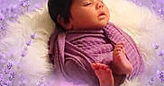 Sitara is registered to the contest to win money with this photo: baby, infant, purple_blanket, fluffy_cushion, lavender_field, flowers, nature, soft_focus, portrait, peaceful, resting, cute, newborn, skin, feet, head, outdoor, calm, closeup, sleepy