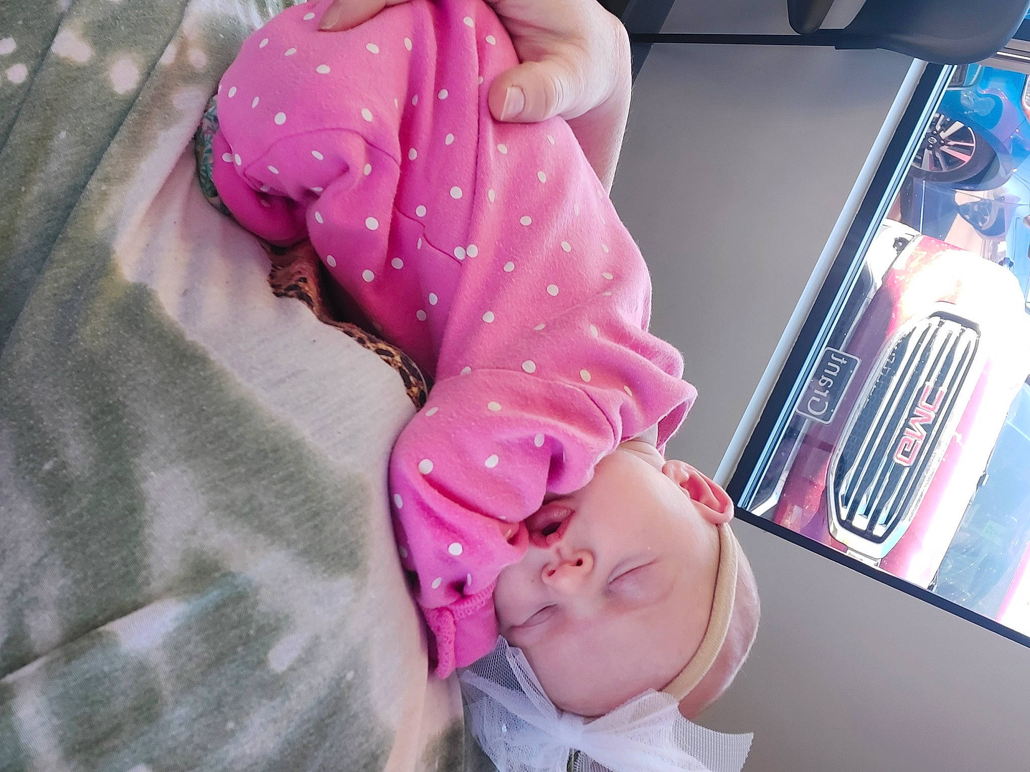 Braylin is registered to the contest to win money with this photo: baby, baby_products, baby_sleeping, baby_toddler_clothing, child, comfort, finger, flooring, gesture, human_leg, linens, magenta, pattern, person, pink, purple, room, sleep, sleeve, textile