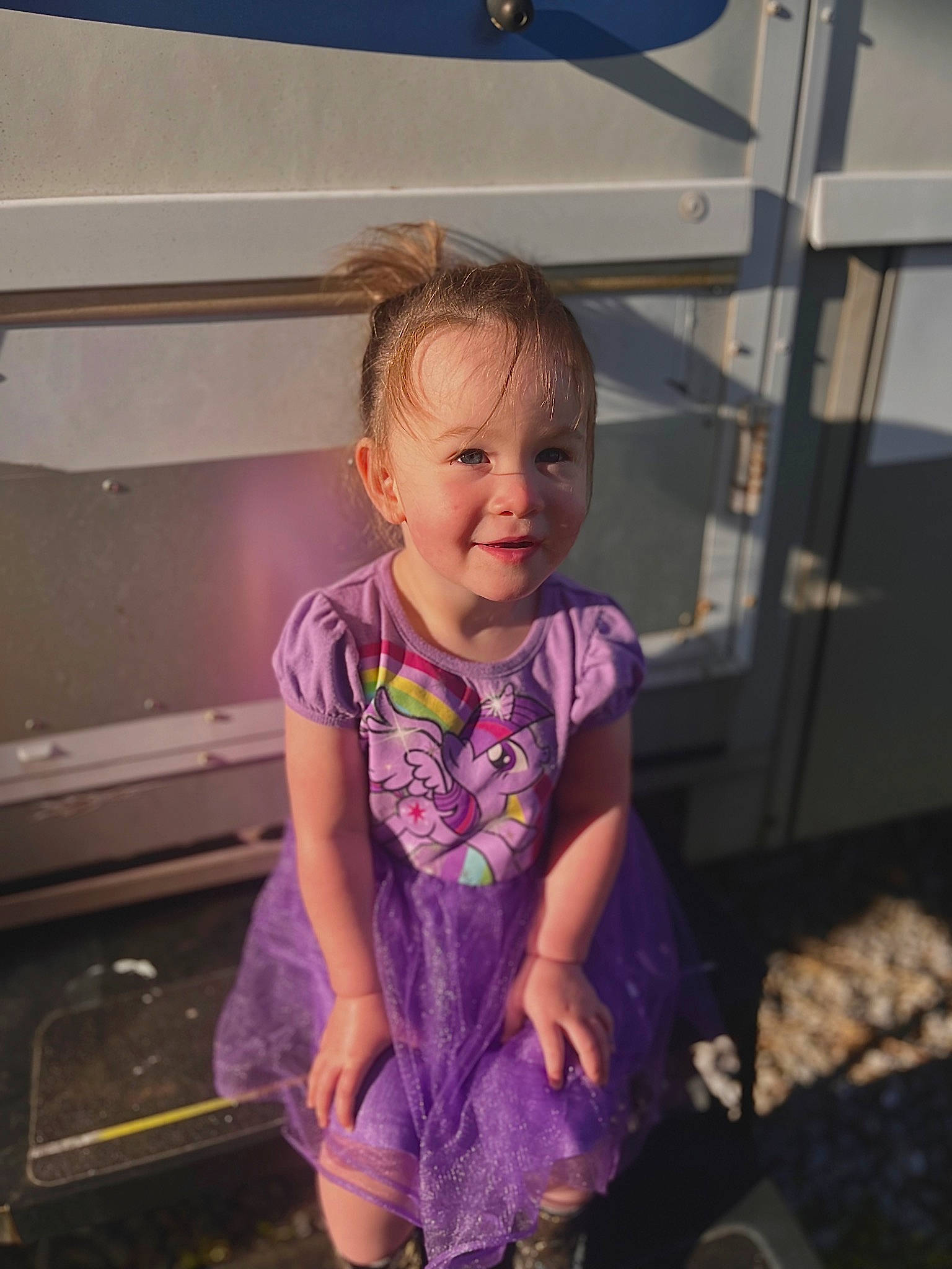 Athena is registered to the contest to win money with this photo: baby_toddler_clothing, child, electric_blue, eye, face, fun, happy, human_body, iris, magenta, person, pink, purple, skin, sleeve, smile, standing, t_shirt, toddler, violet