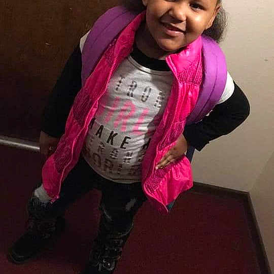 Alexzandria is registered to the contest to win money with this photo: child, cool, day, fun, girl, joy, magenta, outerwear, person, pink, product, purple, smile, textile, toddler