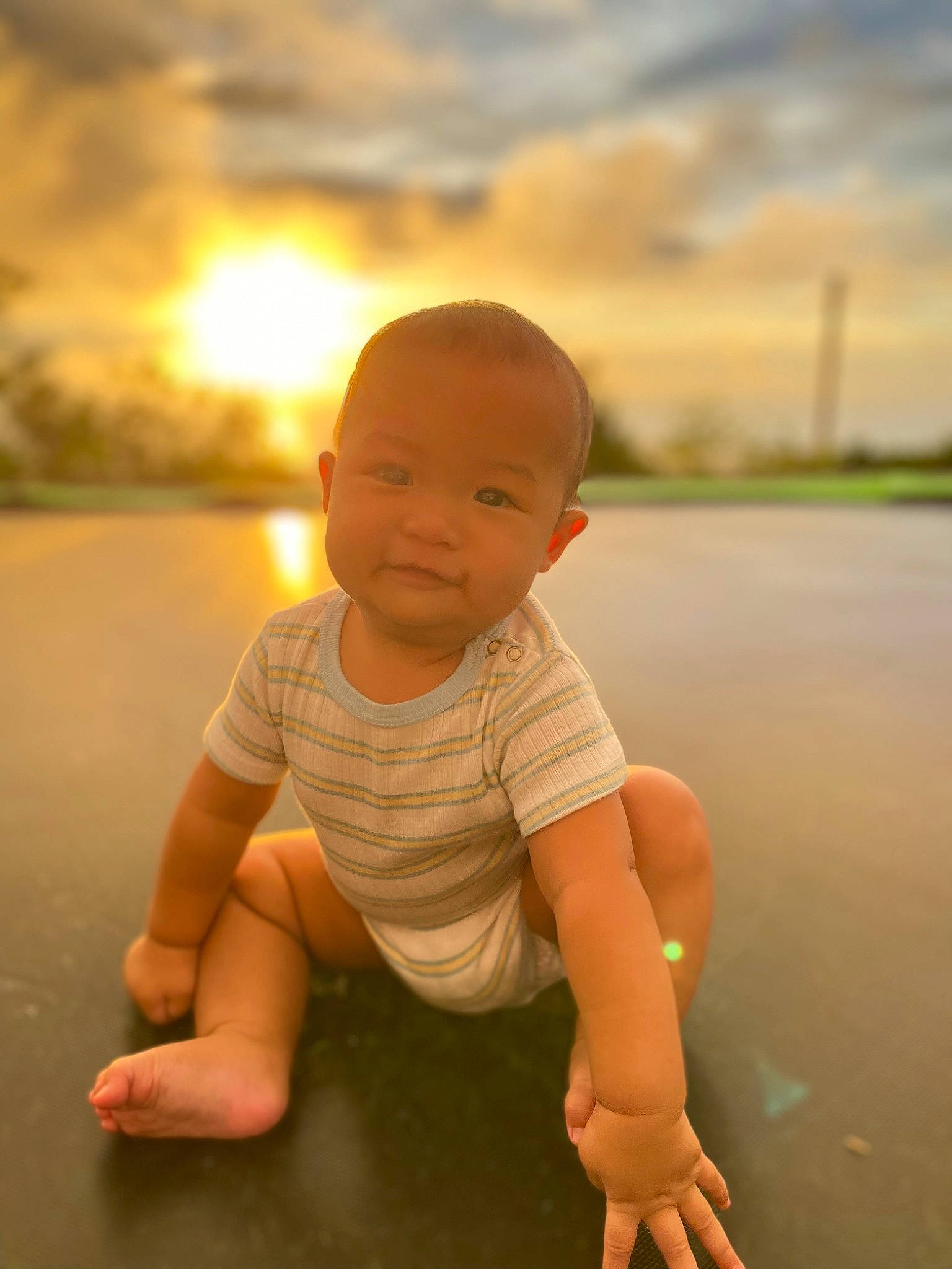 Braze joined the competition — help win amazing prizes! baby, baby_toddler_clothing, cloud, flash_photography, flooring, fun, grass, happy, horizon, human_leg, landscape, leisure, orange, people_in_nature, person, sitting, sky, sleeve, sunset, toddler