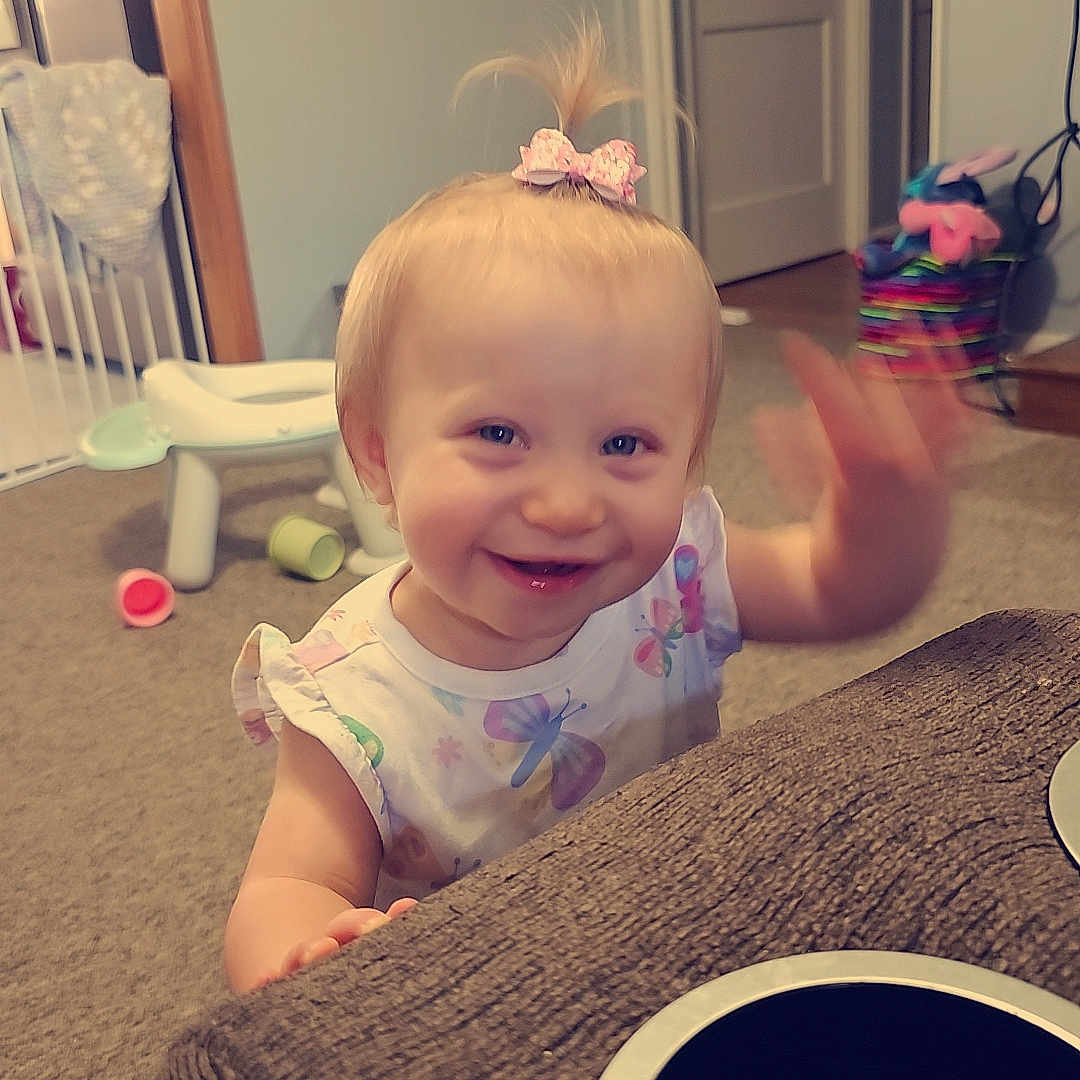 Payton is registered to the contest to win money with this photo: architecture, baby, bodypart, building, couch, device, electricaldevice, face, finger, furniture, hand, head, indoors, livingroom, person, photography, portrait, room, sitting, wood