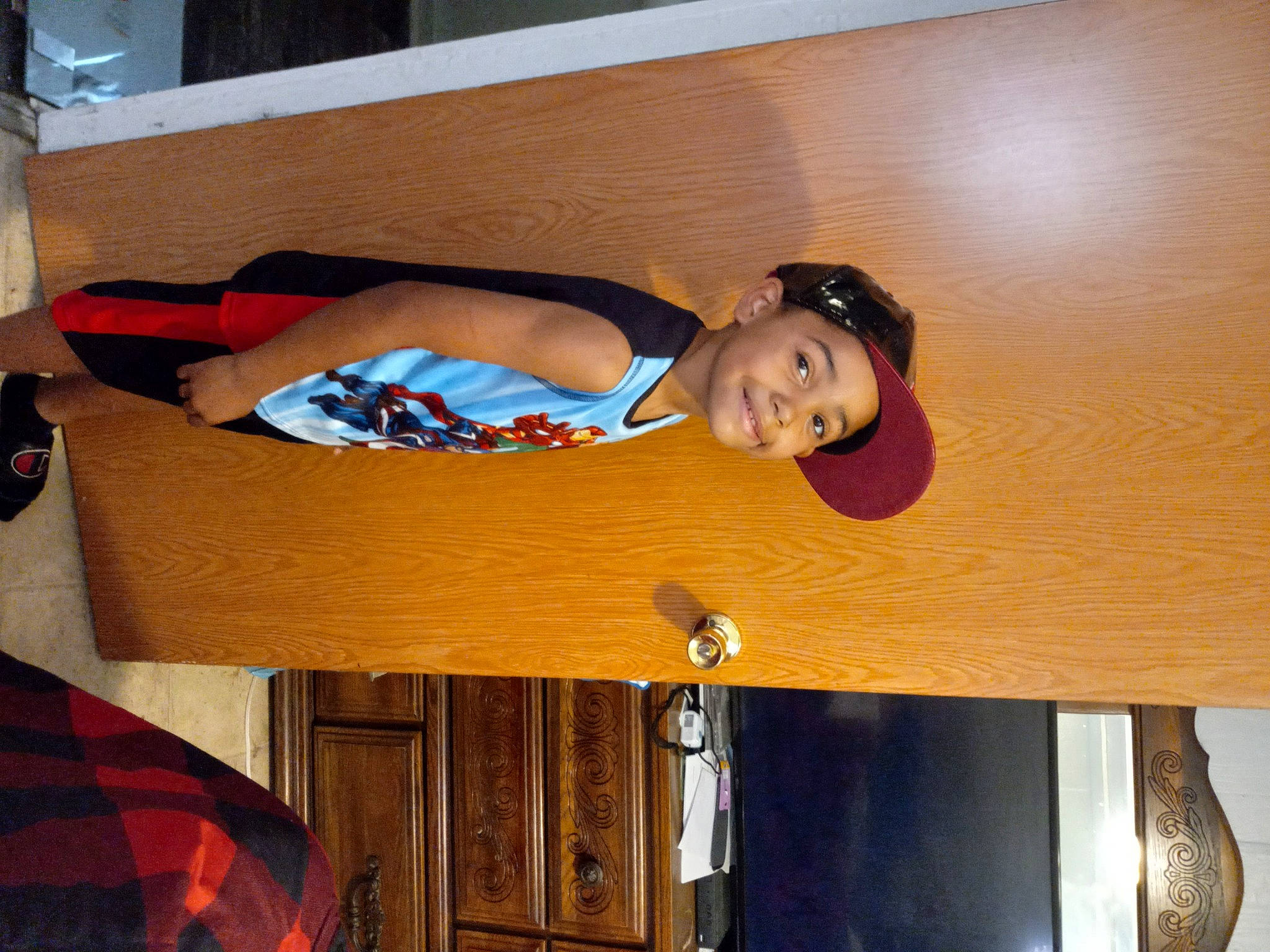 Denzel joined the competition — help win amazing prizes! brown_hair, comfort, dress, elbow, flash_photography, flooring, fun, happy, hardwood, headwear, human_leg, joy, leisure, long_hair, person, room, shoulder, sitting, thigh, trunk