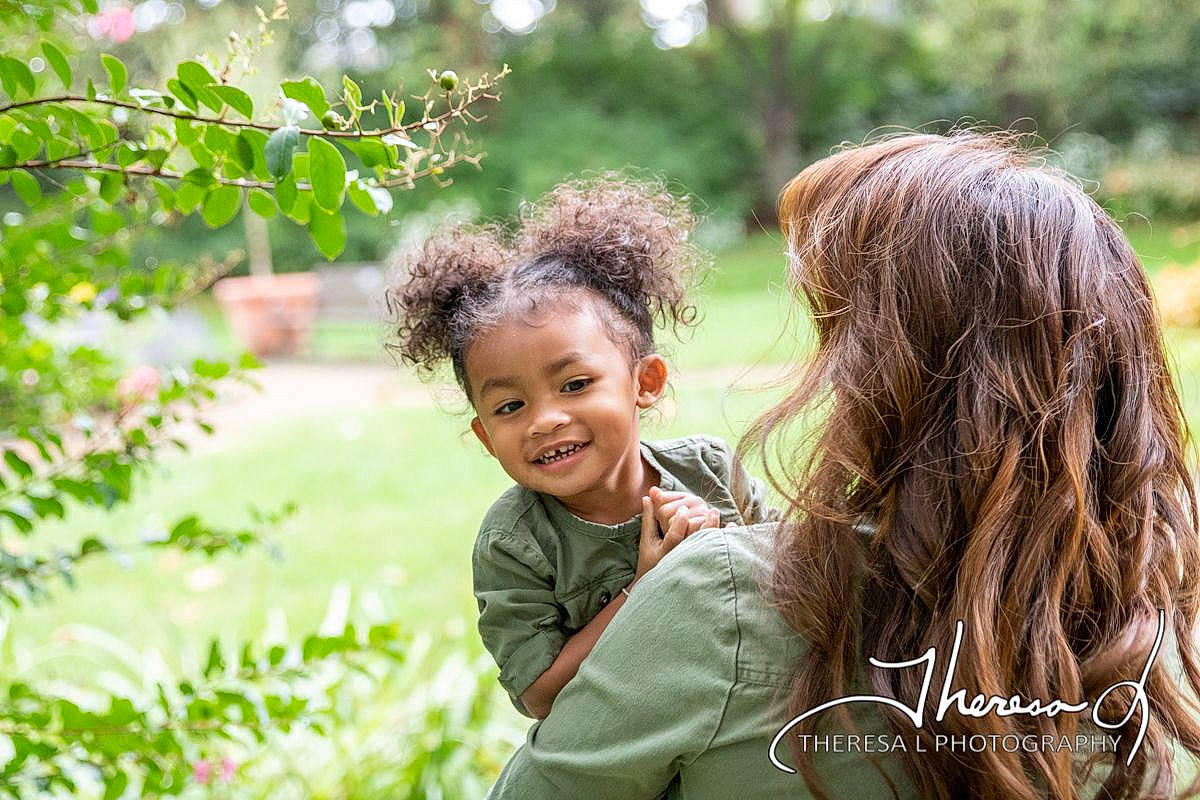 Journie joined the competition — help win amazing prizes! adaptation, black_hair, child, forest, fun, gesture, grass, grass_family, grassland, happy, joy, leisure, love, natural_landscape, people_in_nature, person, plant, sitting, smile, sunlight