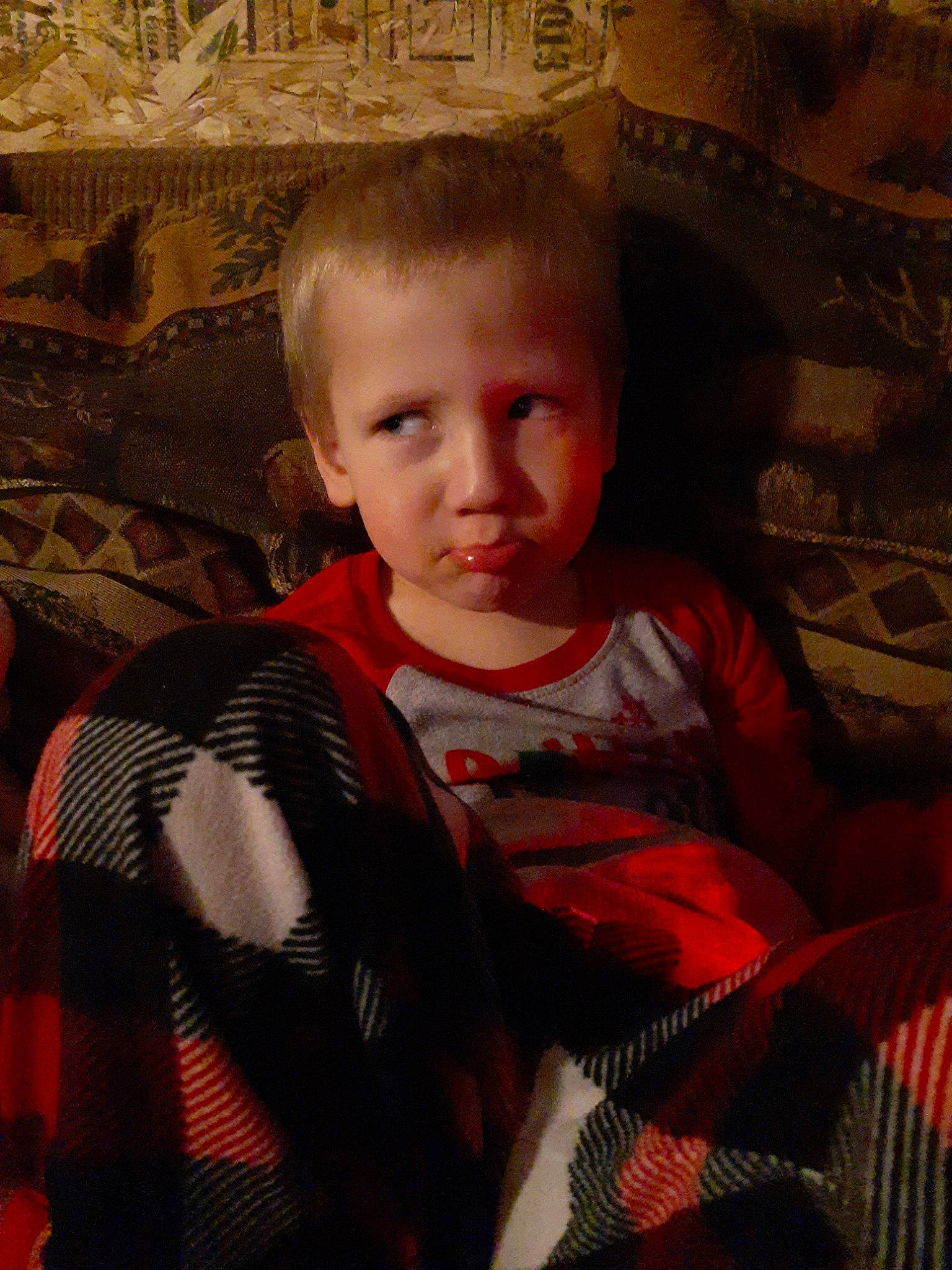 Tyson is registered to the contest to win money with this photo: baby, cheek, child, eye, face, pattern, person, plaid, skin, smile, textile, toddler