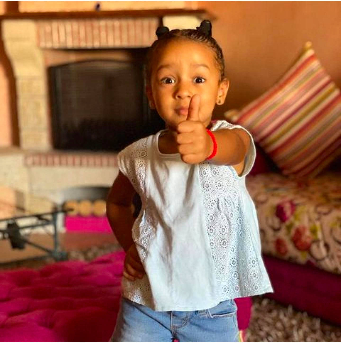 Rihanna joined the competition — help win amazing prizes! baby_toddler_clothing, cheek, child, eye, flooring, fun, gesture, hair, hand, happy, magenta, neck, people, person, pink, room, skin, sleeve, smile, thumb