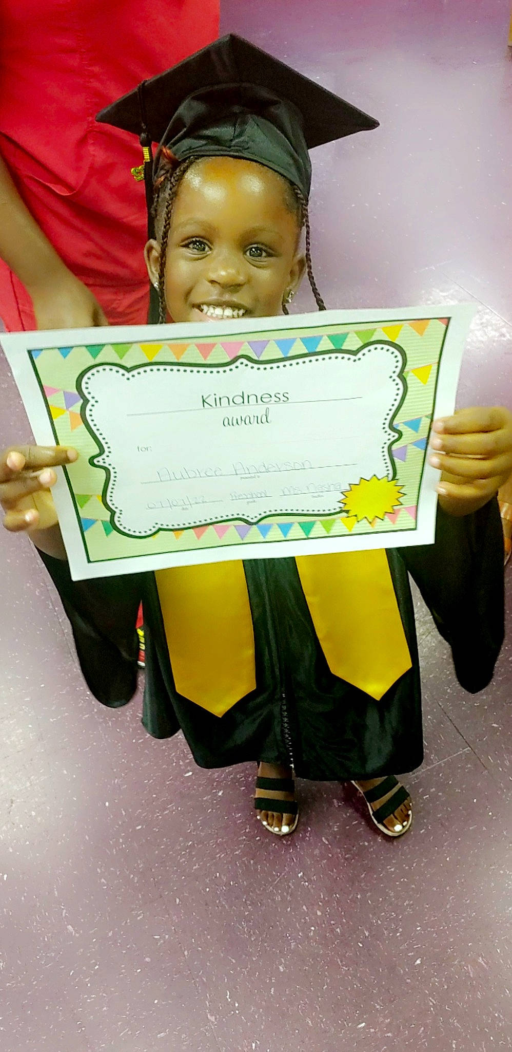 Aubree is registered to the contest to win money with this photo: academic_certificate, adaptation, award, child, event, facial_expression, fashion_accessory, fun, hairstyle, handwriting, happy, headpiece, jewellery, joy, party_supply, person, photography, room, smile, snapshot