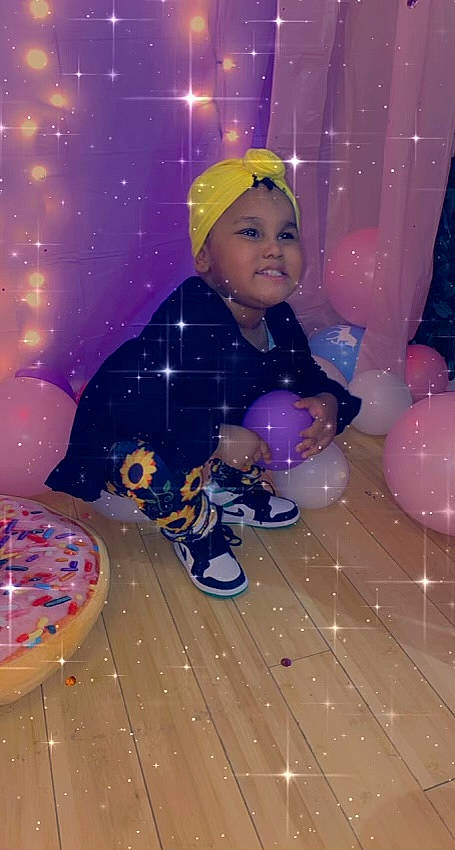 Zendaya joined the competition — help win amazing prizes! balloon, child, christmas, christmas_eve, electric_blue, event, fun, happy, headwear, holiday, joy, leisure, magenta, party_supply, person, pink, purple, recreation, smile, space