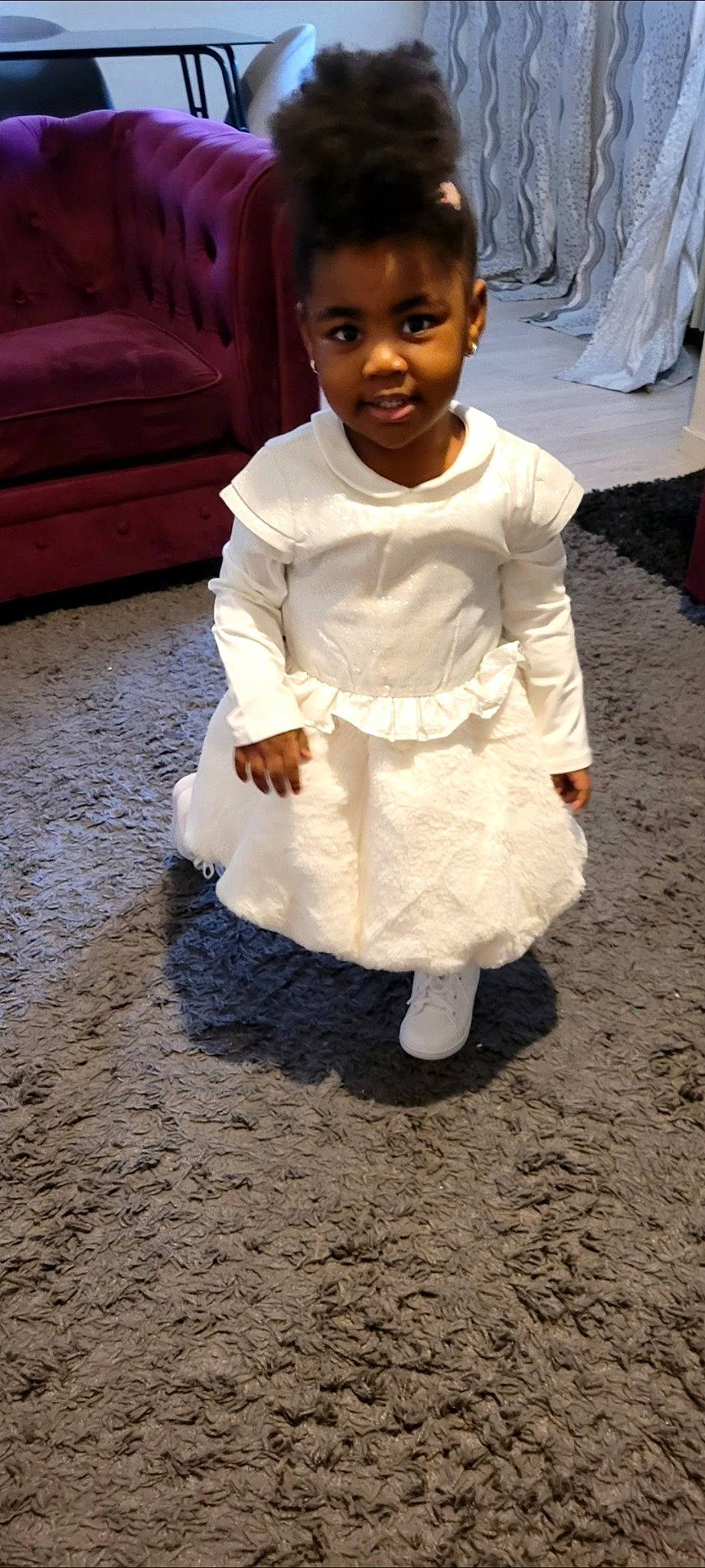 Aliyah participe au concours pour gagner de l'argent avec cette photo : baby, baby_toddler_clothing, chair, child, event, flooring, formal_wear, fun, happy, person, sitting, sleeve, smile, soil, toddler, tradition