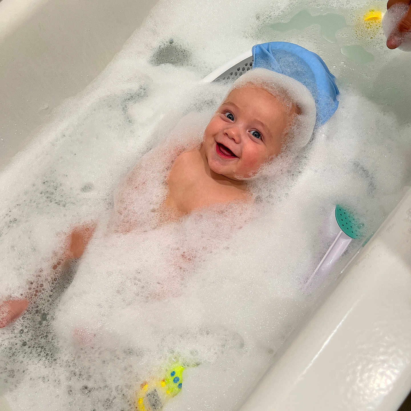 Sawyer joined the competition — help win amazing prizes! baby, bath_time, bathroom, bathtub, blue_cap, bubbles, child, childhood, clean, cute, foam, happy, infant, playful, relaxing, skin, smiling, toy, water, wet