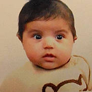 Baris joined the competition — help win amazing prizes! baby, child, face, eyes, sweater, clothing, portrait, cute, infant, expression, head, young, skin, person, indoors, baby_face, closeup, curious, warm, soft_background