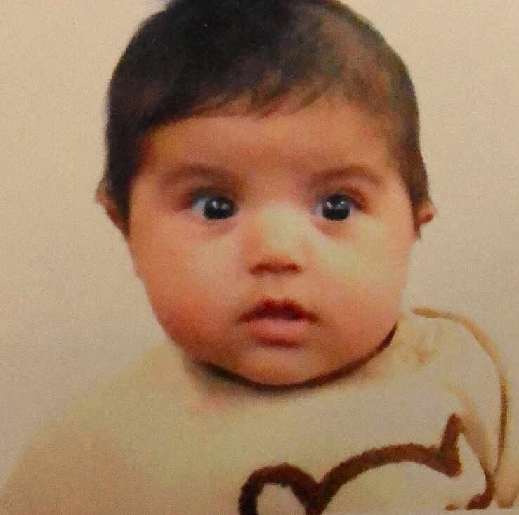 Baris joined the competition — help win amazing prizes! baby, child, face, eyes, sweater, clothing, portrait, cute, infant, expression, head, young, skin, person, indoors, baby_face, closeup, curious, warm, soft_background