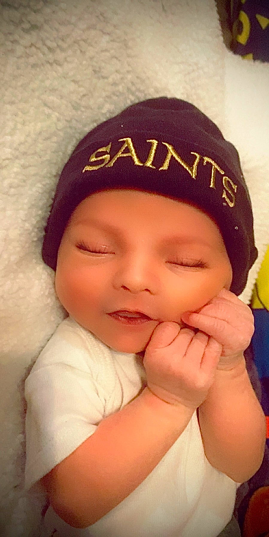 Alayna is registered to the contest to win money with this photo: baby, baby_sleeping, cap, cheek, chin, eye, eyebrow, eyelash, face, gesture, happy, head, headgear, headwear, knit_cap, lip, nose, person, smile, textile