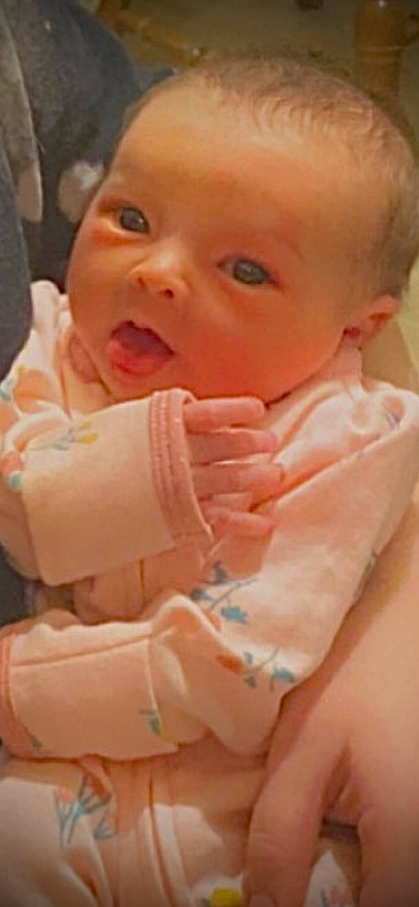 Alayna is registered to the contest to win money with this photo: baby, baby_toddler_clothing, cheek, drinkware, eyelash, face, finger, gesture, hand, head, lip, mouth, nail, neck, nose, person, pink, skin, sleeve, thumb