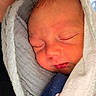 Easton joined the competition — help win amazing prizes! baby, blanket, child, closeup, cozy, cute, face, head, infant, newborn, peaceful, person, portrait, resting, skin, sleeping, soft, swaddled, tiny, wrapped