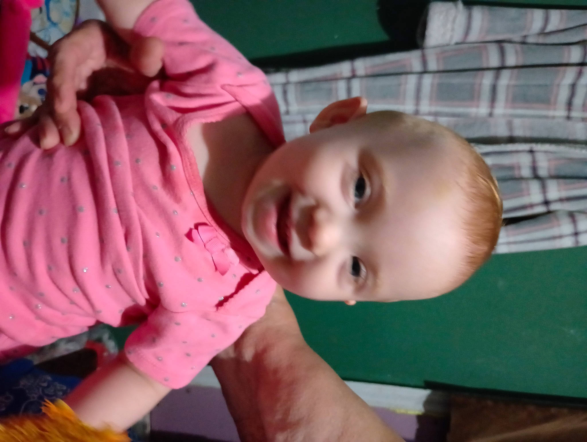 Ashley is registered to the contest to win money with this photo: baby, baby_toddler_clothing, cheek, child, chin, eye, finger, hand, happy, head, human_body, joy, lip, mammal, mouth, nose, person, plant, skin, smile