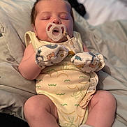 Charles joined the competition — help win amazing prizes! baby, pacifier, sleeping, mittens, onesie, blanket, infant, cozy, soft, cute, child, resting, closeup, indoors, comfort, peaceful, newborn, human, portrait, sleep