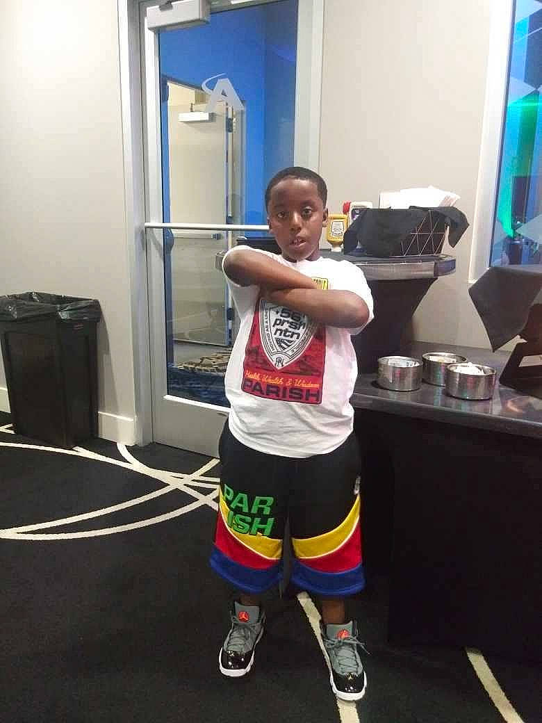 Amarrio joined the competition — help win amazing prizes! active_shorts, boot, cleanliness, elbow, fixture, flooring, fun, gas, human_leg, knee, person, personal_protective_equipment, room, shorts, sneakers, sock, sportswear, standing, sweatpant, t_shirt