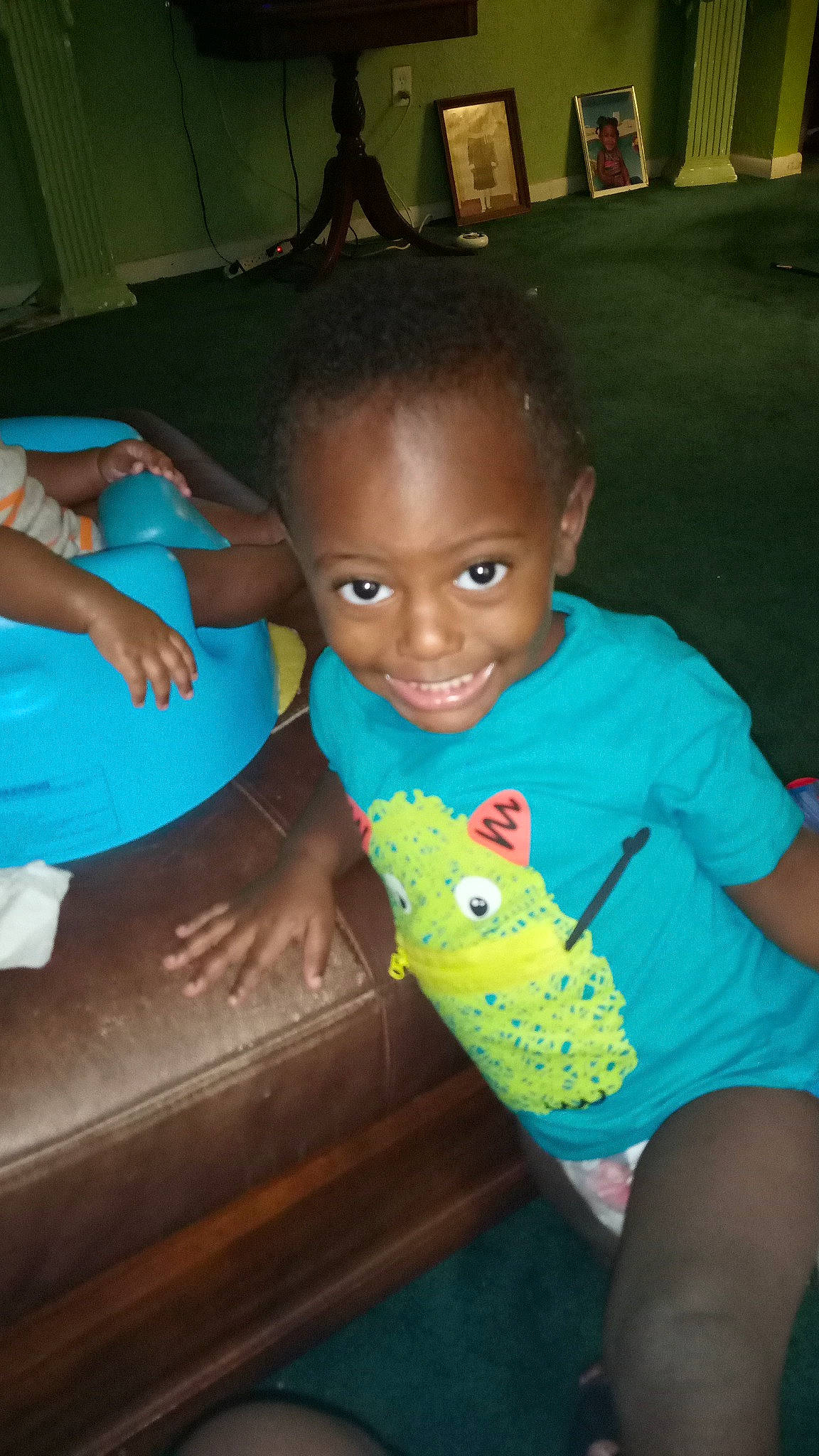 Quavii is registered to the contest to win money with this photo: adaptation, baby, baby_toddler_clothing, chair, cheek, child, cool, eye, fun, happy, iris, joy, leisure, person, play, room, sitting, skin, smile, t_shirt