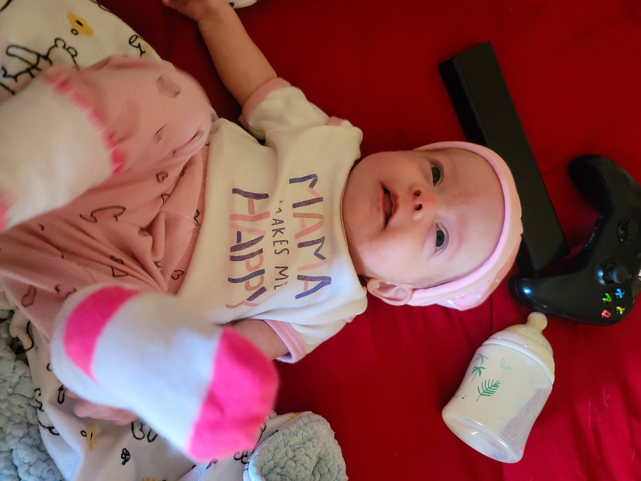Glenda is registered to the contest to win money with this photo: baby, baby_products, baby_toddler_clothing, cheek, child, comfort, eyelash, finger, hand, happy, headwear, person, pink, room, skin, smile, toddler