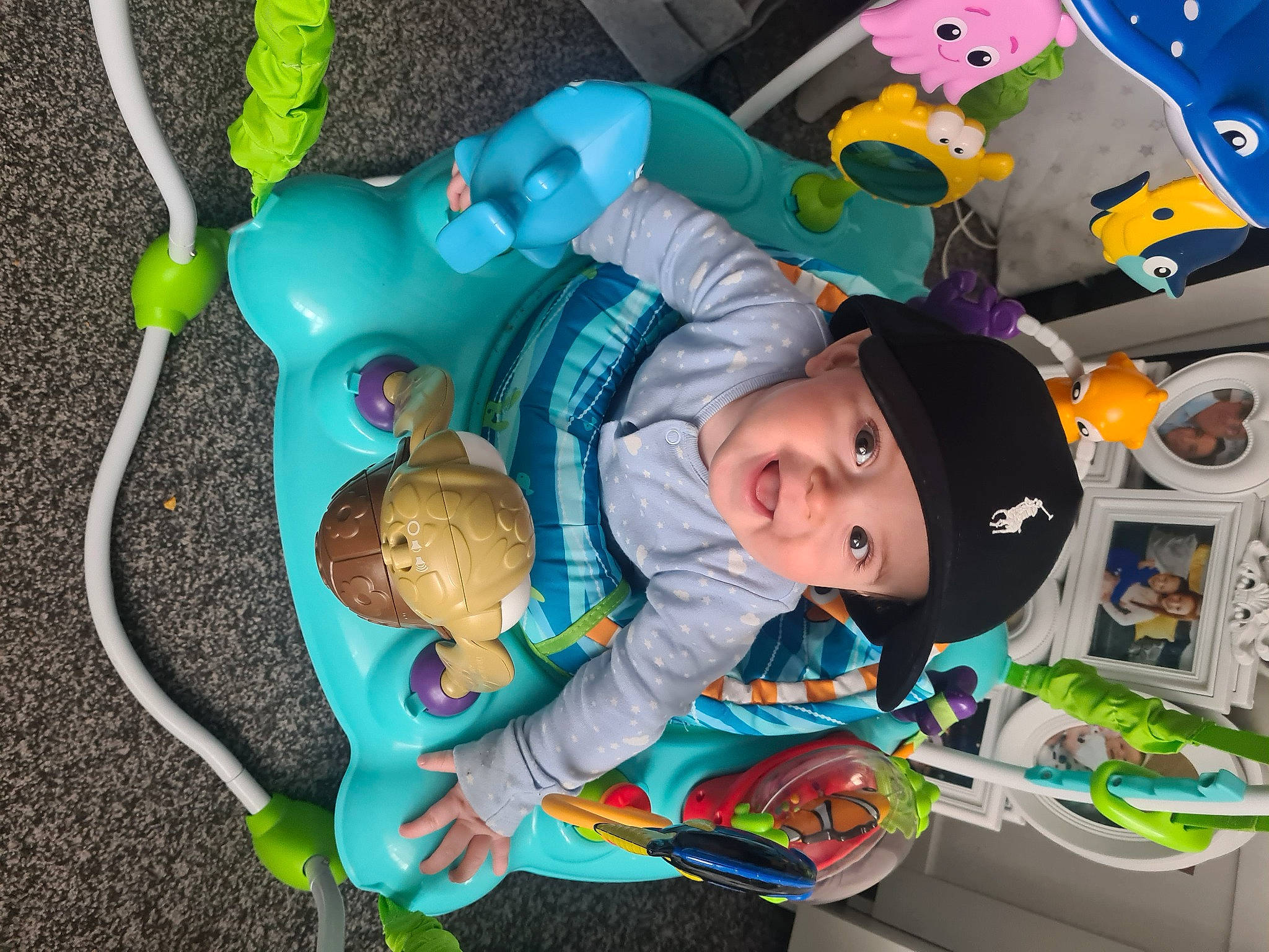 Charlie joined the competition — help win amazing prizes! baby, baby_products, baby_toddler_clothing, baby_toys, child, fun, green, headwear, leisure, person, plastic, play, room, stuffed_toy, toddler, toy, under_exposed