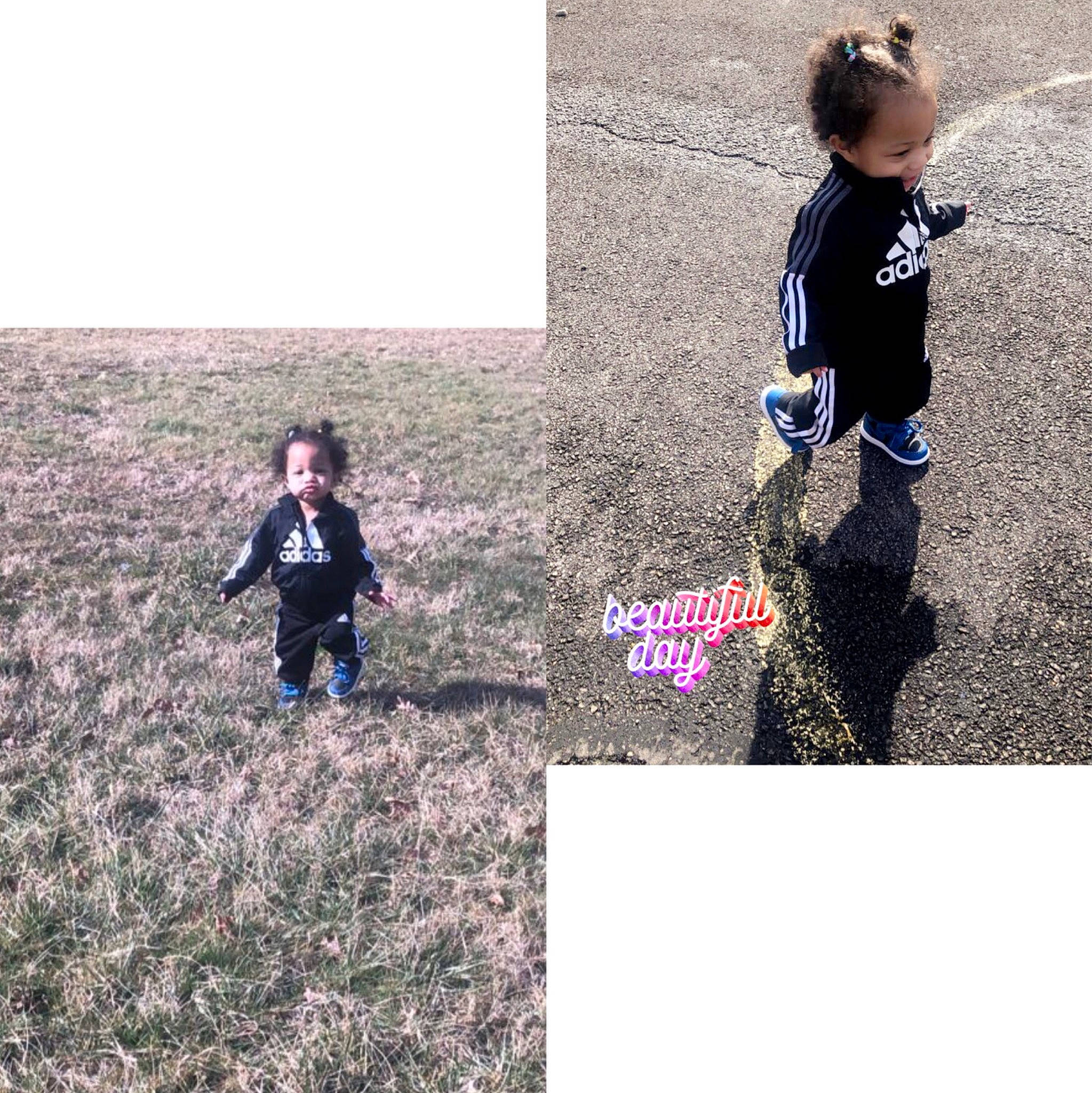 Alaia is registered to the contest to win money with this photo: asphalt, baby, child, flooring, fun, grass, grassland, happy, leisure, pattern, people_in_nature, person, play, recreation, shadow, sitting, sleeve, soil, t_shirt, toddler