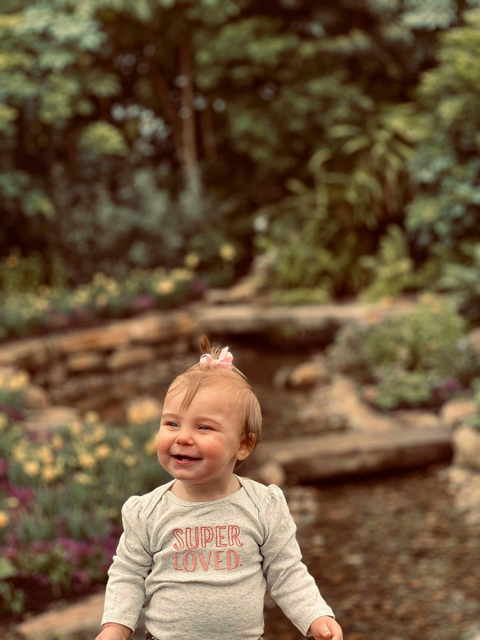 Karmyn is registered to the contest to win money with this photo: baby, flash_photography, forest, fun, garden, grass, happy, joy, landscape, leisure, natural_environment, people_in_nature, person, plant, smile, soil, tints_and_shades, toddler, tree, wilderness
